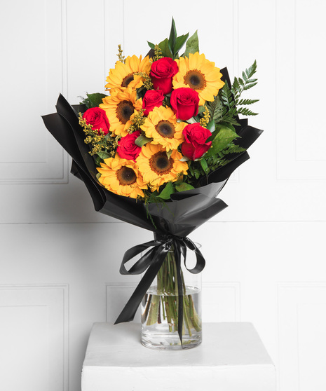 Surprise that special someone with a beautiful mixed floral wrap!