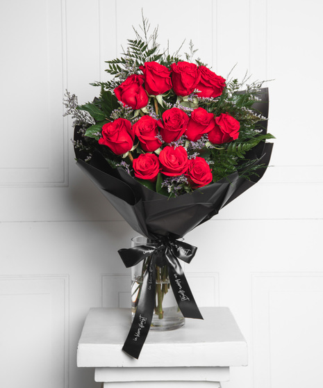 One Dozen Wrapped Roses - Vase Not Included