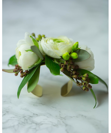 Perfect for Prom or Homecoming! This traditional boutonniere of italian ruscus, and an elegant white rose is the perfect accessory to your special day.