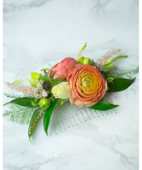 Perfect for Prom or Homecoming! This traditional boutonniere of italian ruscus, and an elegant white rose is the perfect accessory to your special day.