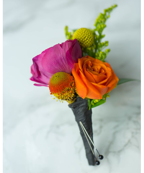 Perfect for Prom or Homecoming! This traditional boutonniere of italian ruscus, and an elegant white rose is the perfect accessory to your special day.