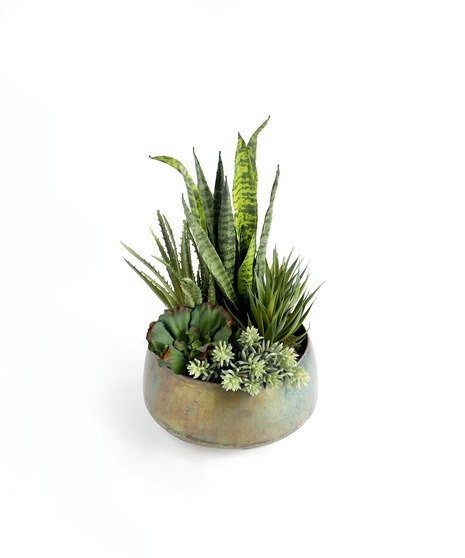 This deluxe handcrafted silk plant garden is designed to be enjoyed as a forever gift or decor piece in the home. The plants in this planter are comprised of 100% silk.